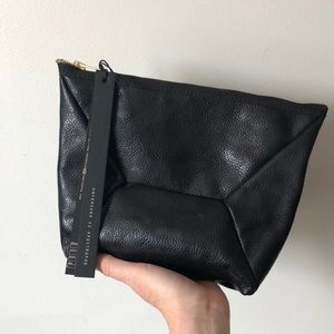 Never before used, leather pouch with camo detail